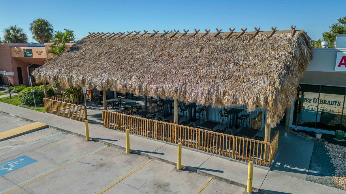 Drone view of the exterior of a tiki